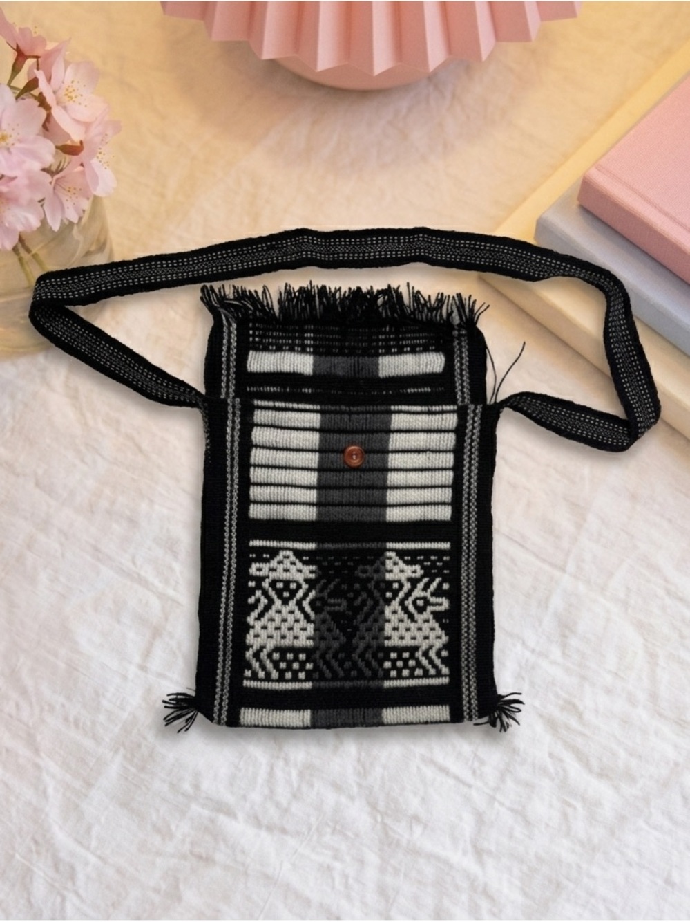 Woman’s Black and White Woven Crossbody Bag with Geometric Motif